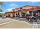 Ford's Garage exterior showcasing vintage cars and gas pumps for a nostalgic dining experience at 3083 Key Lime Loop, Kissimmee, FL 34747