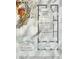 Detailed first floor plan of a charming vacation home, including kitchen, living and dining spaces at 3083 Key Lime Loop, Kissimmee, FL 34747