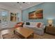 Cozy living room with a comfortable couch and stylish decor at 3083 Key Lime Loop, Kissimmee, FL 34747