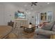 Cozy living room with neutral tones, decorative accents, and a staircase at 3083 Key Lime Loop, Kissimmee, FL 34747