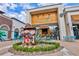 Exterior view of Tequilas Taco Cantina with wooden accents, a statue and outdoor seating at 3083 Key Lime Loop, Kissimmee, FL 34747