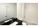 Bathroom view featuring a bathtub, tile surround, granite vanity, and modern fixtures at 3259 Energy Dr, Kissimmee, FL 34747