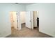 Another bedroom featuring plush carpet, white walls, and a walk-in closet at 3259 Energy Dr, Kissimmee, FL 34747