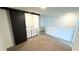 Upstairs landing with laundry area featuring washer, dryer, and sliding door at 3259 Energy Dr, Kissimmee, FL 34747