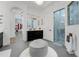Elegant bathroom showcasing dual vanities, a glass-enclosed shower, and an archway leading to additional spaces at 3382 Fernlake Pl, Longwood, FL 32779