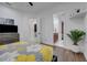 Bright bedroom featuring hardwood floors, walk-in closet, and an ensuite bathroom at 3382 Fernlake Pl, Longwood, FL 32779