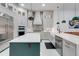 Modern kitchen with stainless steel appliances, stylish pendant lights, island with quartz countertop and backsplash at 3382 Fernlake Pl, Longwood, FL 32779