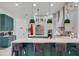 Large kitchen island with seating, modern appliances, and stylish pendant lighting at 3382 Fernlake Pl, Longwood, FL 32779
