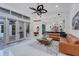 Bright living room featuring open floor plan, tile floors, and view of the kitchen at 3382 Fernlake Pl, Longwood, FL 32779