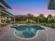 Inviting backyard pool and spa surrounded by brick pavers and lush landscaping, perfect for outdoor living at 3382 Fernlake Pl, Longwood, FL 32779