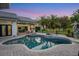 Inviting backyard pool and spa surrounded by brick pavers and lush landscaping, perfect for relaxation at 3382 Fernlake Pl, Longwood, FL 32779