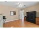 Cozy bedroom featuring hardwood floors, ceiling fan, and neutral wall color at 3514 Golfview Blvd, Orlando, FL 32804
