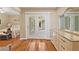 Bedroom with hardwood floors and French doors leading to outdoor space at 3514 Golfview Blvd, Orlando, FL 32804