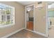 Entryway featuring tile floors and an open view of the living room and laundry room at 3514 Golfview Blvd, Orlando, FL 32804