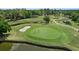 View of the meticulously maintained golf course with scenic water features and lush greenery at 3514 Golfview Blvd, Orlando, FL 32804