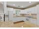 Bright kitchen with white appliances and stone countertops at 3514 Golfview Blvd, Orlando, FL 32804