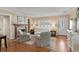Cozy living room with fireplace, neutral furniture, and hardwood floors at 3514 Golfview Blvd, Orlando, FL 32804
