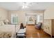 Bright main bedroom with hardwood floors and neutral decor at 3514 Golfview Blvd, Orlando, FL 32804