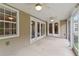 Covered porch with ceiling fans and access to the backyard and house at 3514 Golfview Blvd, Orlando, FL 32804