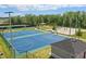 Community sport courts provide basketball, tennis, and volleyball for residents at 4307 Pebbles Throw Dr, Kissimmee, FL 34746