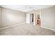 Spacious bedroom featuring a ceiling fan, and ensuite bathroom with a door leading to it at 5004 Ashford Falls Ln, Oviedo, FL 32765
