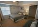 Cozy bedroom with a full bed and decorative pillows and a nautical theme at 5300 S Atlantic Ave # 4-302, New Smyrna Beach, FL 32169