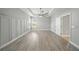 Bright, airy bedroom with tray ceiling, modern ceiling fan, and plenty of natural light at 5829 Valentino Way, Lakeland, FL 33812