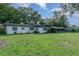 A well-maintained backyard and patio area offer a peaceful retreat at 605 Ensenada Dr, Orlando, FL 32825