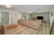 Well-lit living room with decorative fireplace and direct access from front door at 605 Ensenada Dr, Orlando, FL 32825