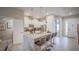 Open-concept kitchen boasts a large island with seating and modern finishes at 7595 Sunny Dreams Ln, Kissimmee, FL 34747