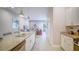 Eat-in kitchen flows into the living room area at 7595 Sunny Dreams Ln, Kissimmee, FL 34747