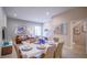 Open floor plan showcasing dining area and cozy living space at 7595 Sunny Dreams Ln, Kissimmee, FL 34747