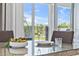 Bright dining area with sliding glass doors offering scenic views and natural light at 7759 Westland Dr, Kissimmee, FL 34747