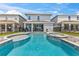 Inviting backyard pool and spa featuring a patio area, perfect for relaxing and entertaining at 7759 Westland Dr, Kissimmee, FL 34747