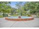 Circular fountain as a centerpiece in a beautiful community park at 796 Mcintyre Ave, Winter Park, FL 32789