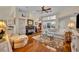 Inviting living room features hardwood floors, a fireplace, and plenty of natural light at 796 Mcintyre Ave, Winter Park, FL 32789