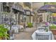 Outdoor dining area with tables and chairs at a local restaurant at 796 Mcintyre Ave, Winter Park, FL 32789