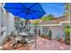 Cozy outdoor patio with brick flooring, seating, and a relaxing ambiance at 796 Mcintyre Ave, Winter Park, FL 32789
