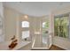 Bright staircase landing with many windows allowing natural light to pour in and views of the outside at 796 Mcintyre Ave, Winter Park, FL 32789
