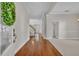 Welcoming foyer with hardwood floors, elegant trim, and a view into the adjacent living spaces at 821 Veranda Pl, Celebration, FL 34747