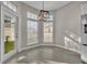 Bright breakfast nook with three windows and a door to the outside at 821 Veranda Pl, Celebration, FL 34747