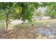 The home features a large backyard and sunroom, with mature shade trees at 8506 Shady Glen Dr, Orlando, FL 32819