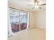 Bedroom with tile flooring and access to sunroom with hot tub, great for relaxation at 8506 Shady Glen Dr, Orlando, FL 32819