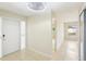 Bright foyer with tile flooring and decorative chandelier at 8506 Shady Glen Dr, Orlando, FL 32819