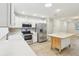 Kitchen featuring stainless steel appliances, counter space, and a center island at 8506 Shady Glen Dr, Orlando, FL 32819