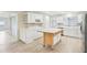 Well-equipped kitchen with stainless appliances, a center island, and lots of countertop space at 8506 Shady Glen Dr, Orlando, FL 32819