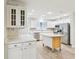 Well-lit kitchen featuring stainless steel appliances, custom cabinetry, and a center island at 8506 Shady Glen Dr, Orlando, FL 32819