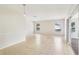 Spacious living area with tile flooring, pendant lighting, and sliding glass doors at 8506 Shady Glen Dr, Orlando, FL 32819