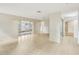 Open living space with tile floors, natural light, and seamless flow to other rooms at 8506 Shady Glen Dr, Orlando, FL 32819