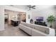 Open concept living room and kitchen area with stylish island and comfortable seating at 8643 Coventry Park Way, Windermere, FL 34786
